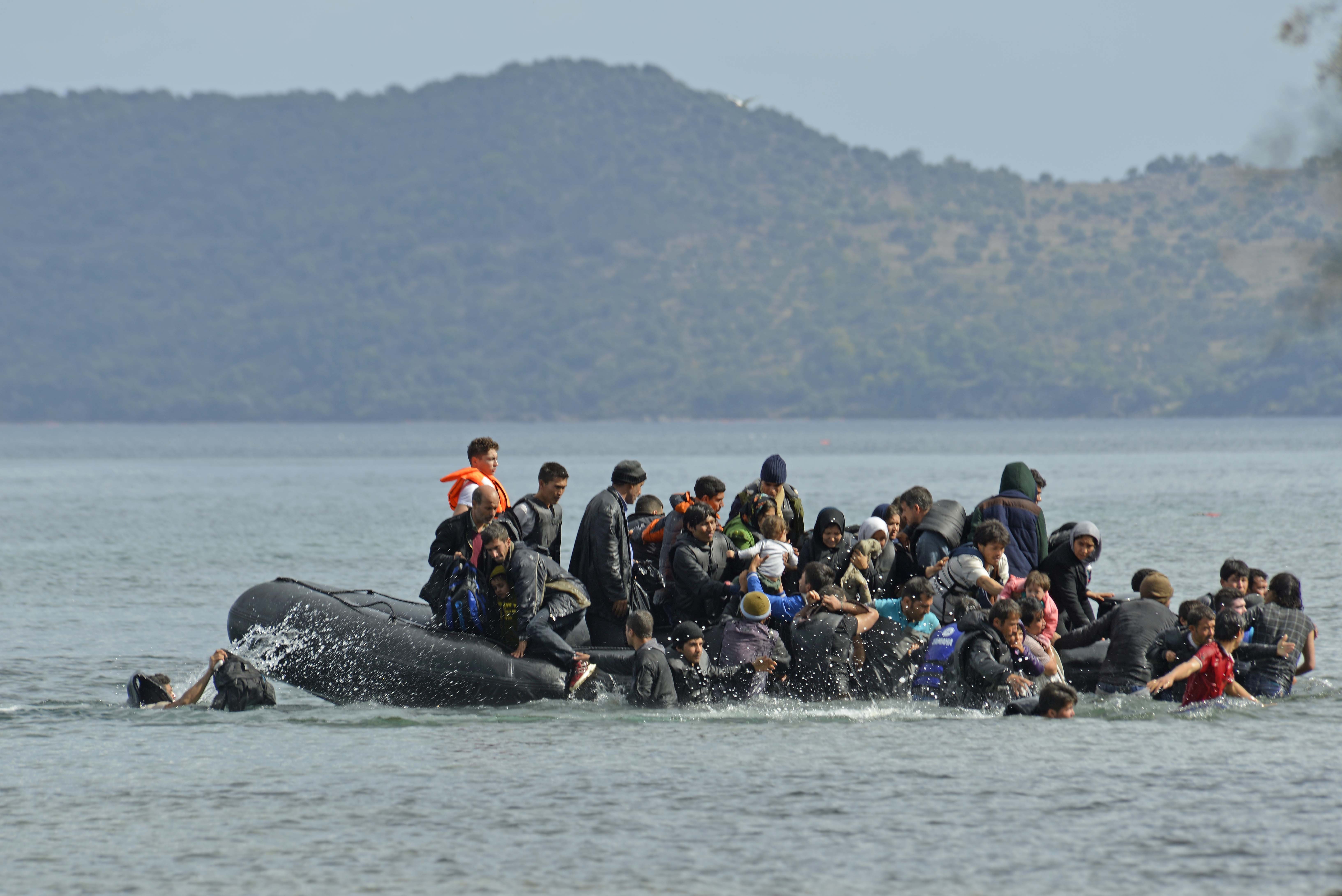 Migrant boat on Greek shores. Photo: SHUTTERSTOCK