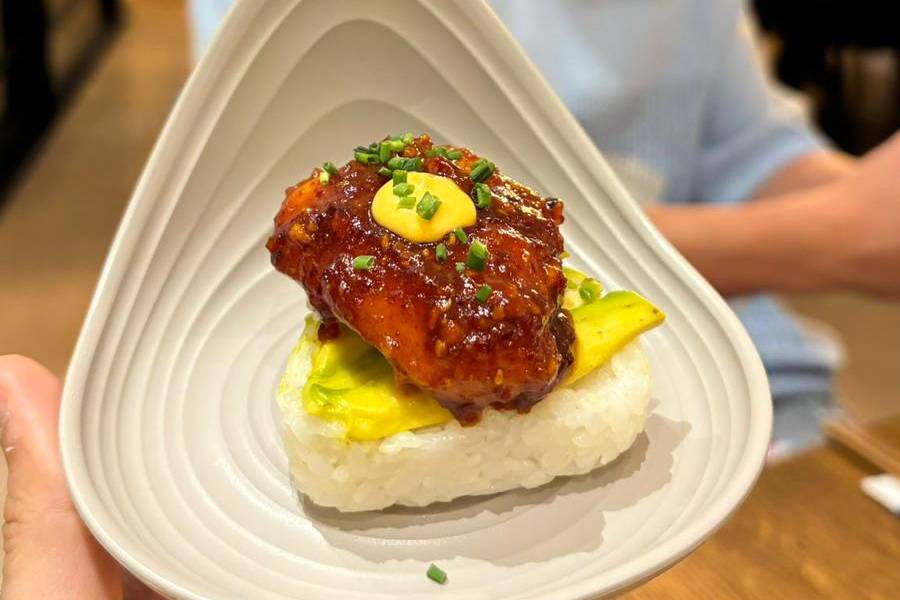 Rice Triangle, Avocado, and Fried Chicken with Korean Sauce. Photo: Matan Hetzroni