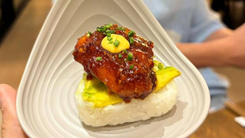 Rice Triangle, Avocado, and Fried Chicken with Korean Sauce. Photo: Matan Hetzroni
