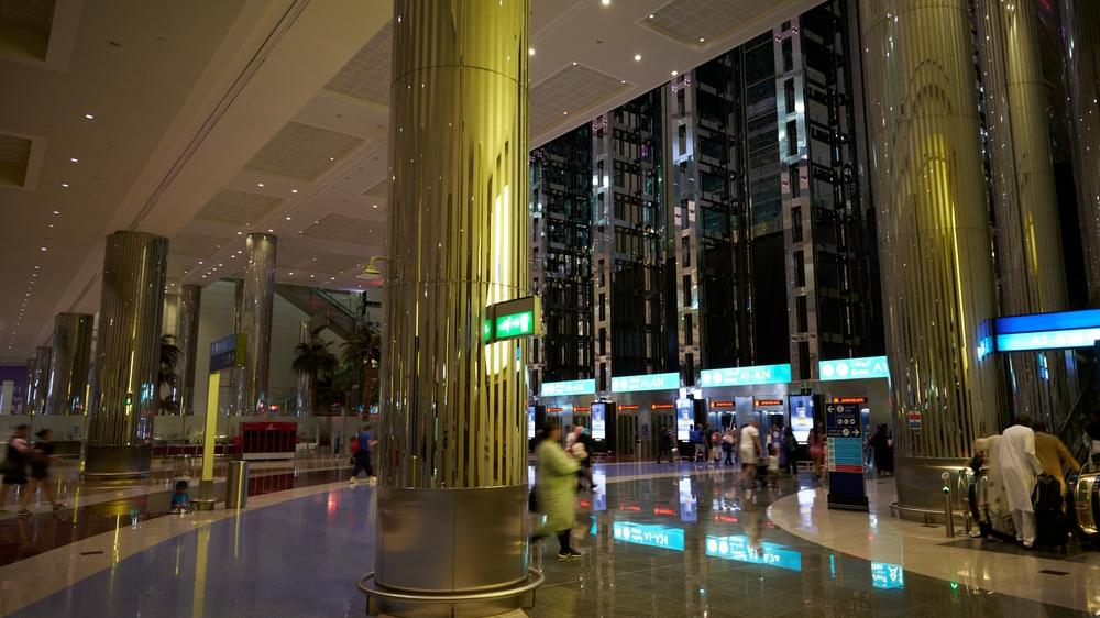 DXB Dubai International Airport terminal in Dubai / Shutterstock