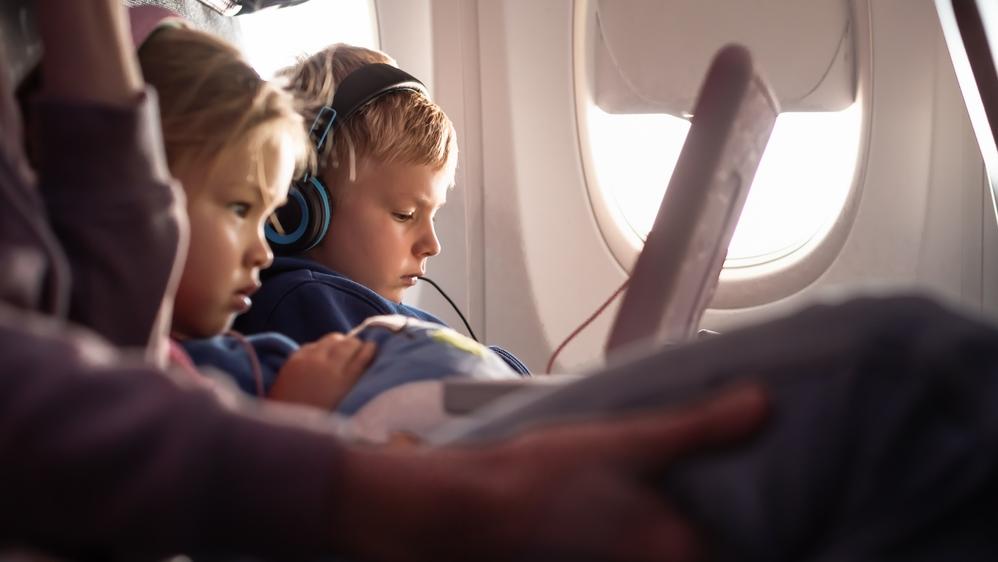 Children under 14 sit free next to their parents. Photo: Shutterstock