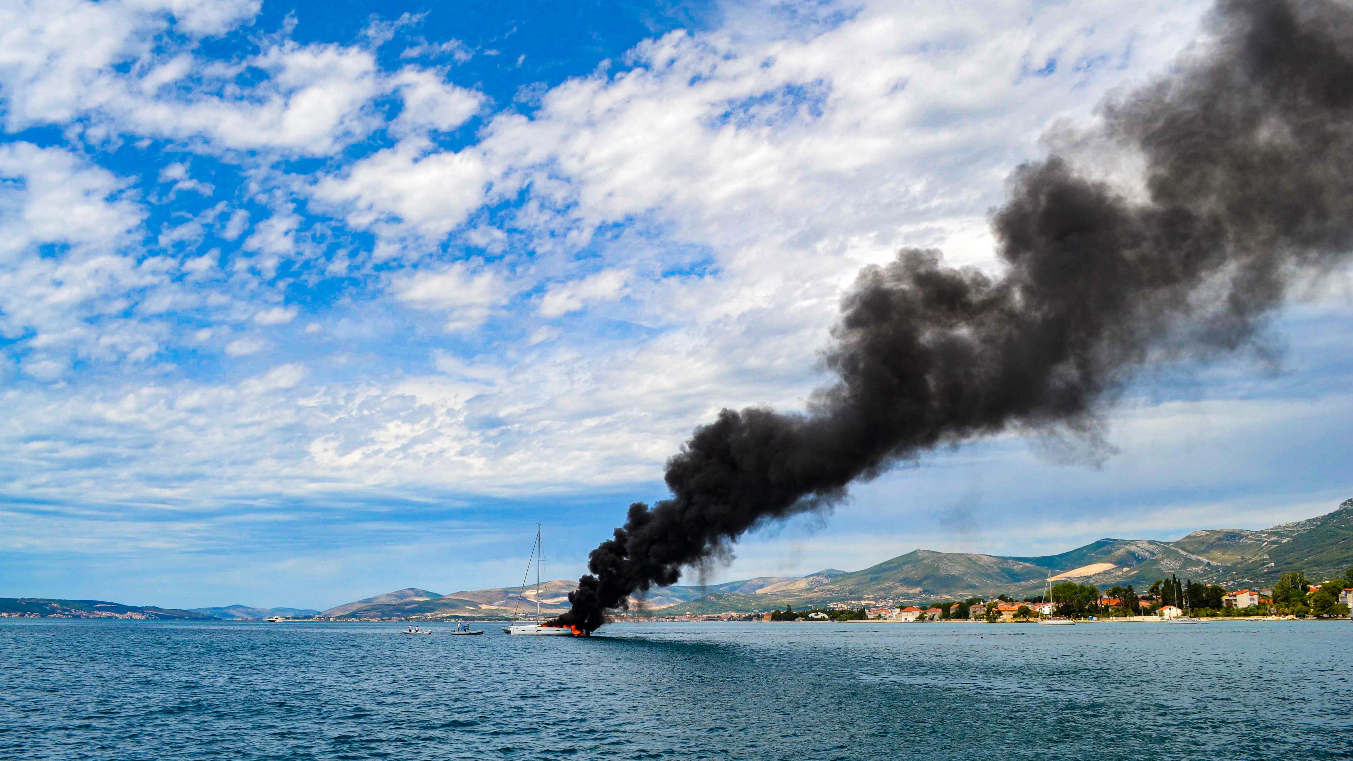 Boat in marina caught on fire. Photo: Shutterstock