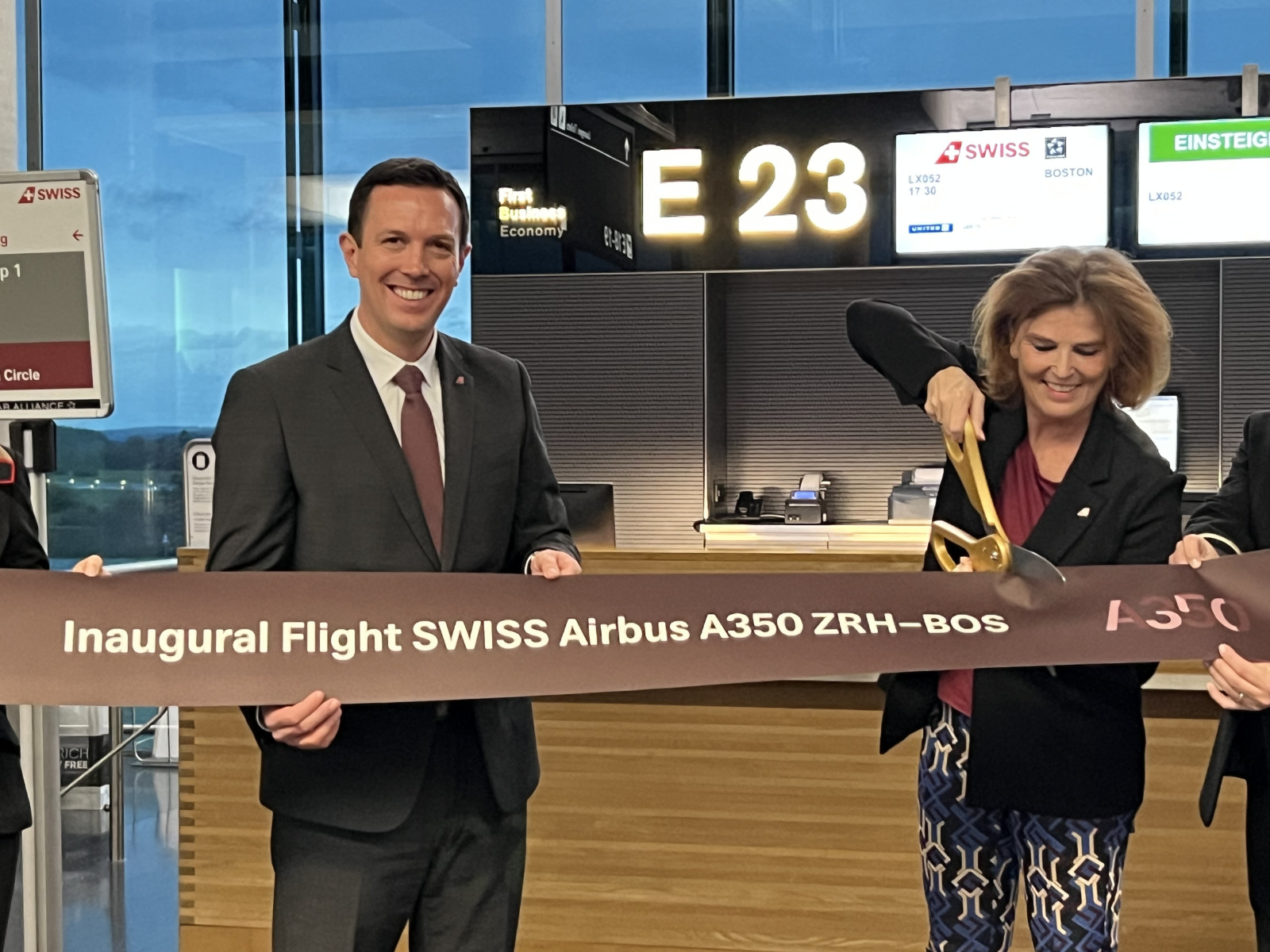 Ribbon Cutting on Inaugural Flight. Swiss CEO and Commercial Manager. Photo: Swiss