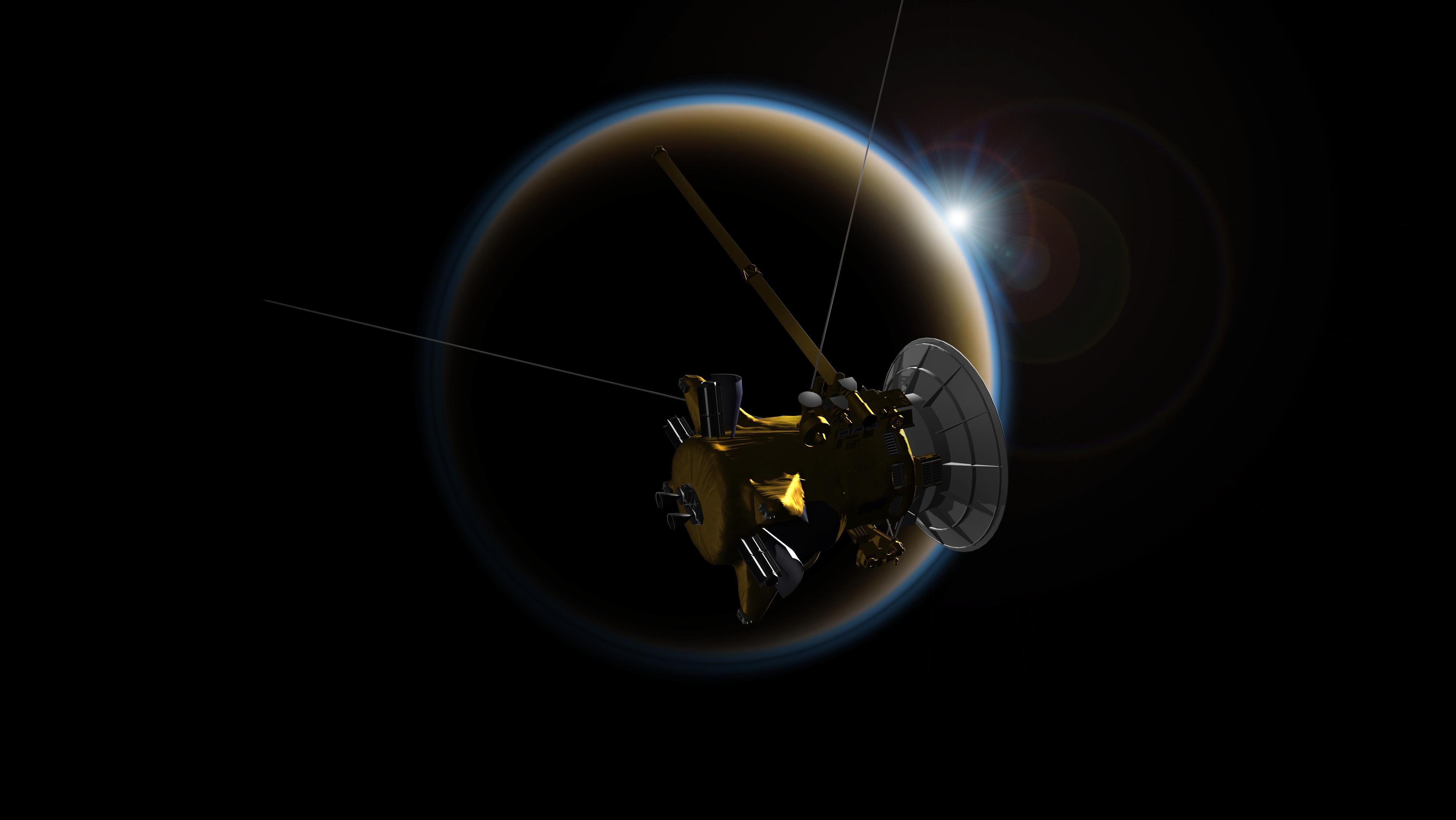 החללית Cassini של נאס"א ליד הירח טיטאן. צילום: NASA/JPL-Caltech