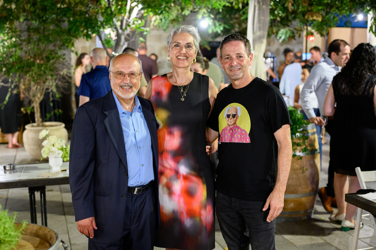 ערן דורון, לורה ודיוויד מיראז' בחגיגות האפלסיון. צילום: רון רחמים
