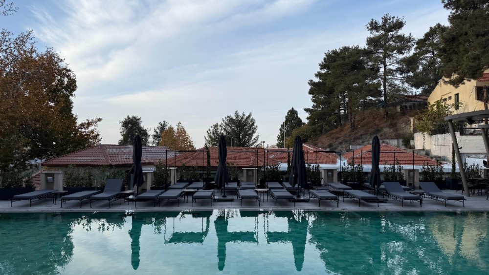 Photo: Uri Obrotski. A year-round heated pool with an amazing view at the Pendeli Boutique Hotel in the mountains