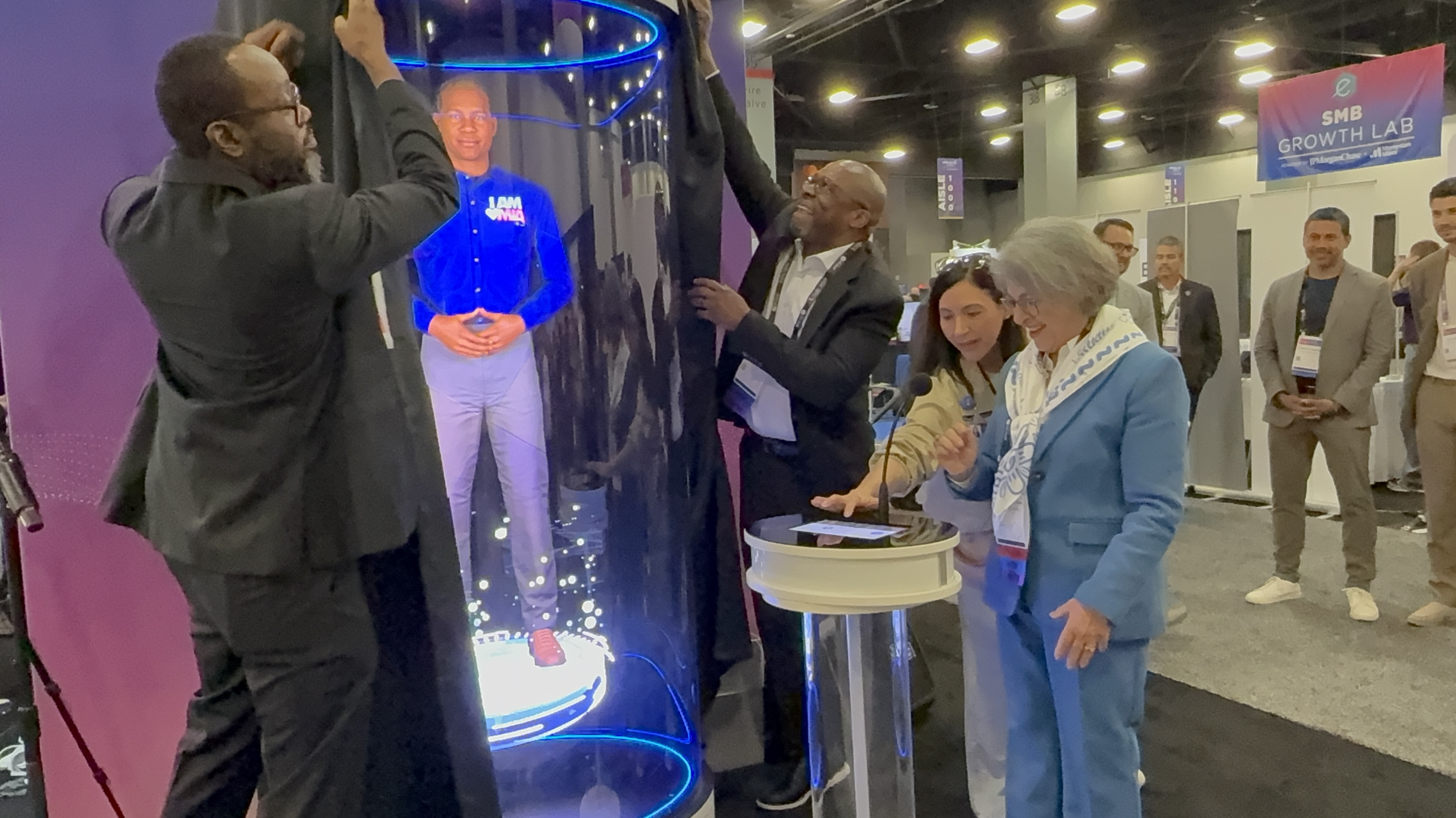 Miami-Dade County Mayor Daniella Levine Cava tests out one of MIA’s new hologram chatbots at eMerge.. Photo: Miami Airport
