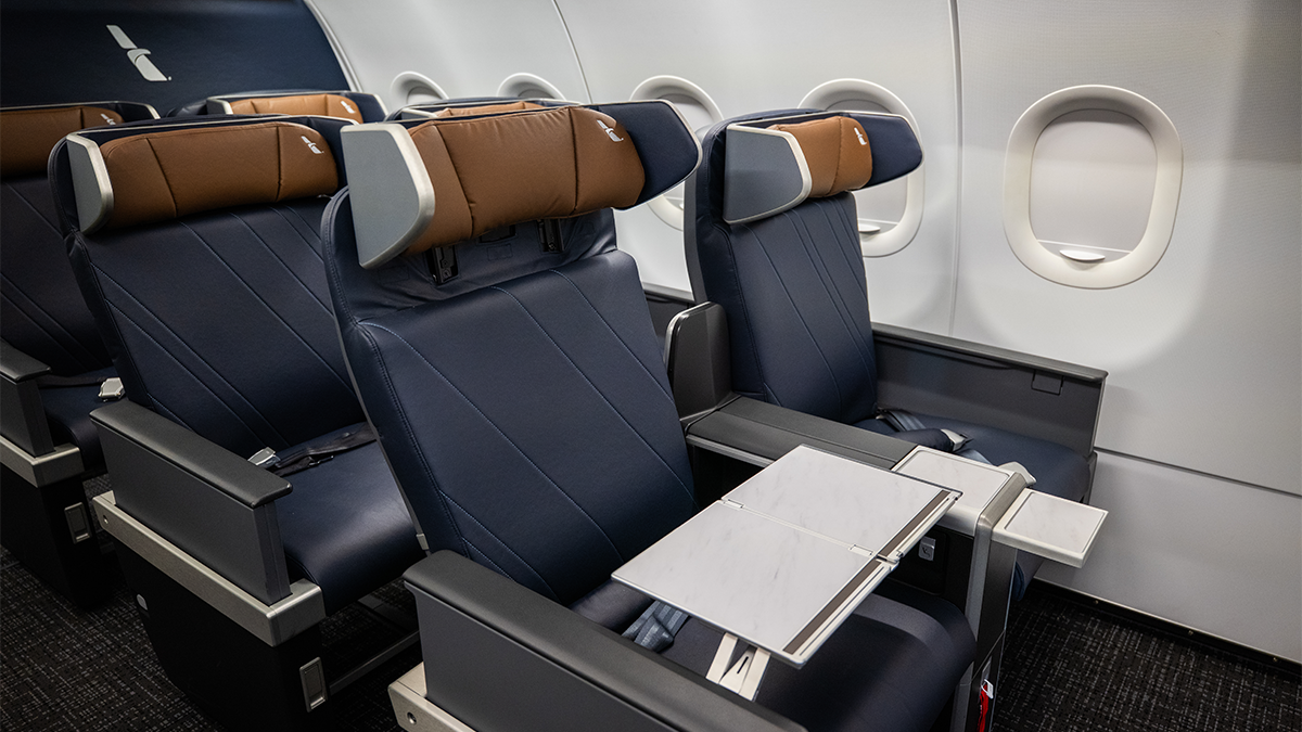 The Airbus A319 and A320 retrofitted aircraft feature more premium seating with privacy wings, additional storage and two beverage trays. Photo: American Airlines 