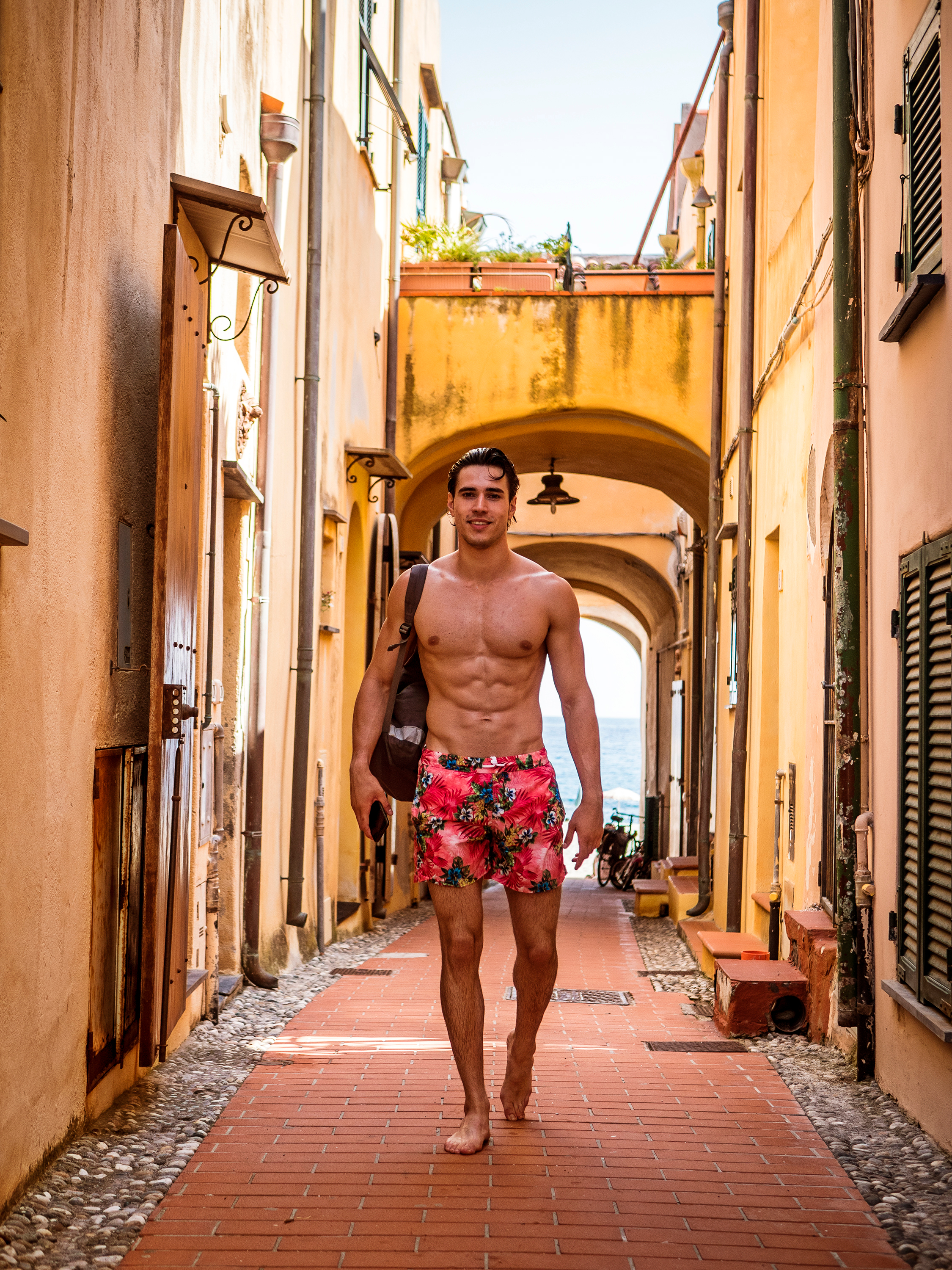 Walking shirtless in Italy could get you a fine. Photo: Shutterstock