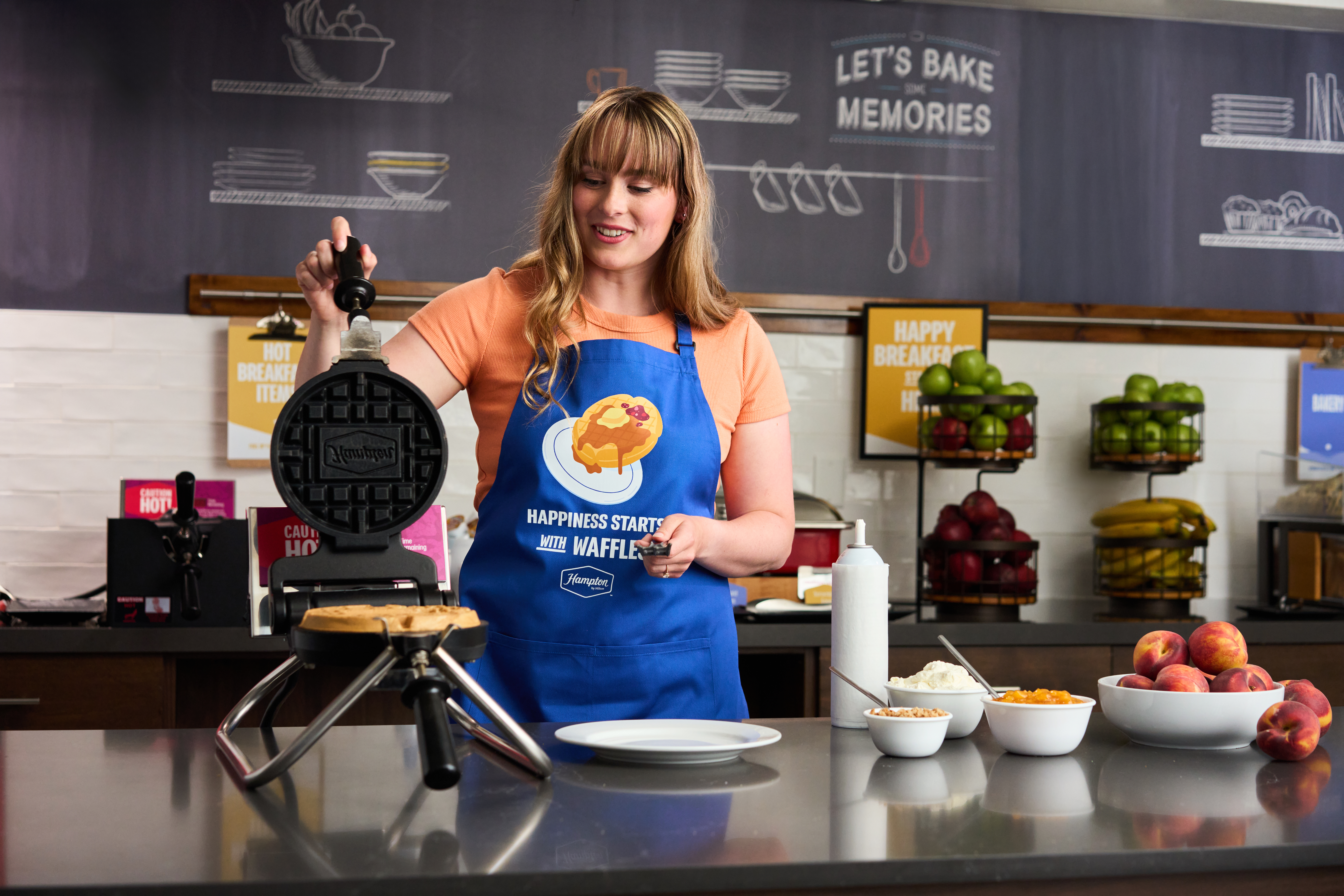 Kaylee Voight making waffles. Photo: © 2026 Hilton 
