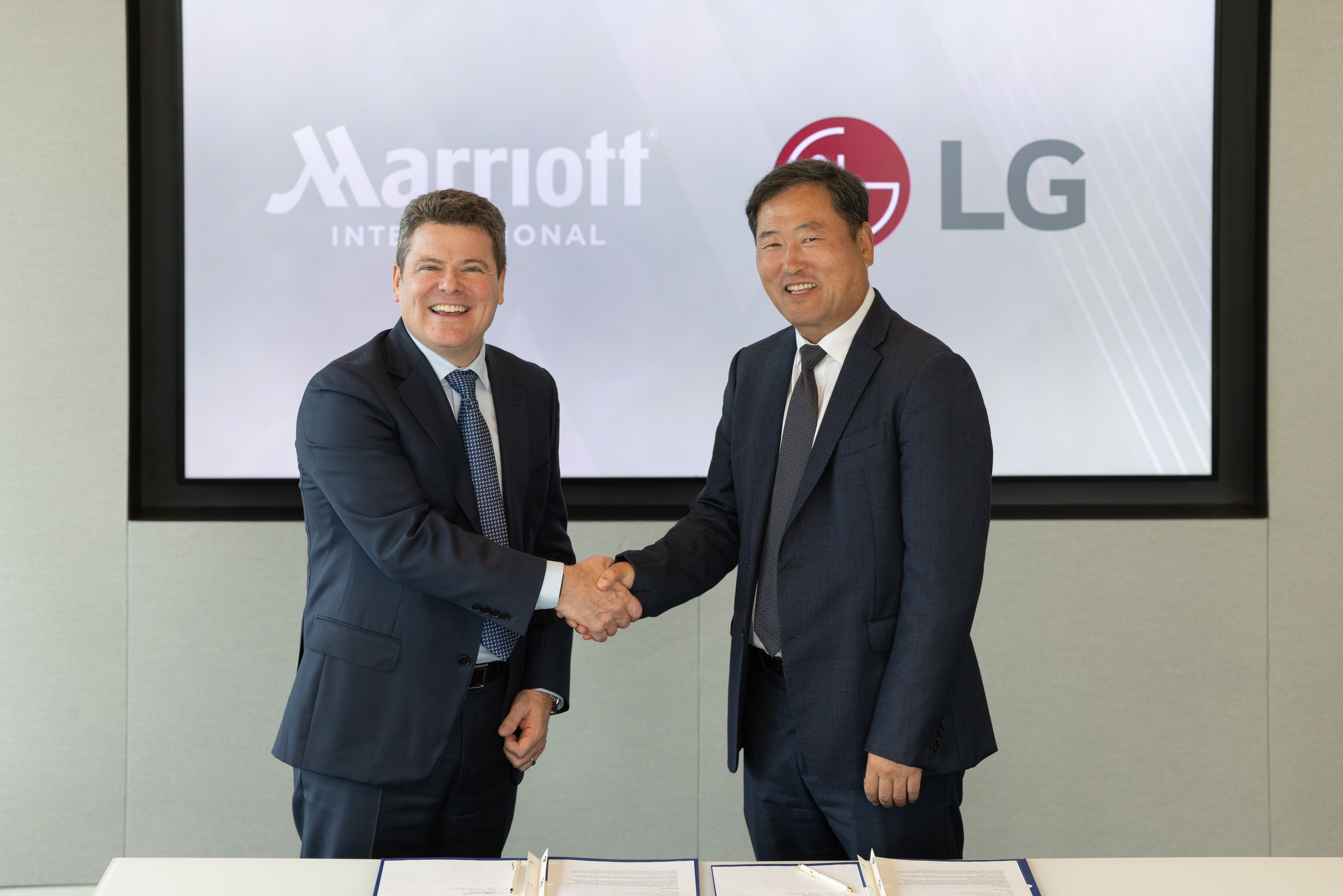 Drew Pinto (Marriott), and Don Kwack (LG). Photo: Marriot International
