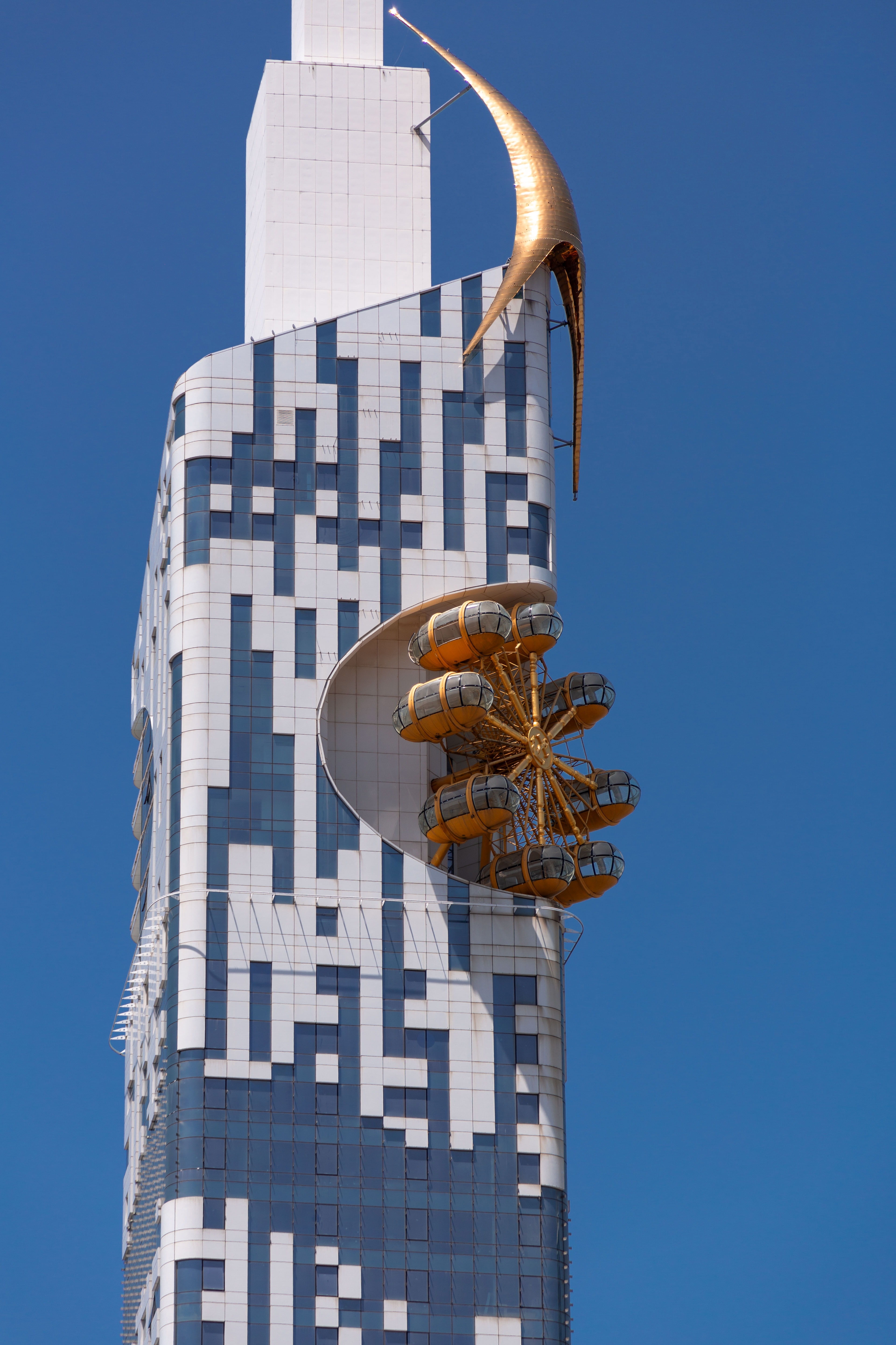 ABatumi Tower with small ferris wheel. Photo: ColorMaker / Shutterstock.com