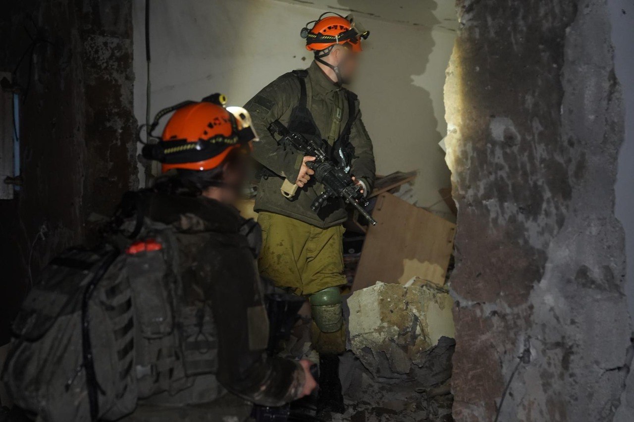 Documenting Home Front Command operations at an impact zone in southern Israel. Photo: IDF spokesperson
