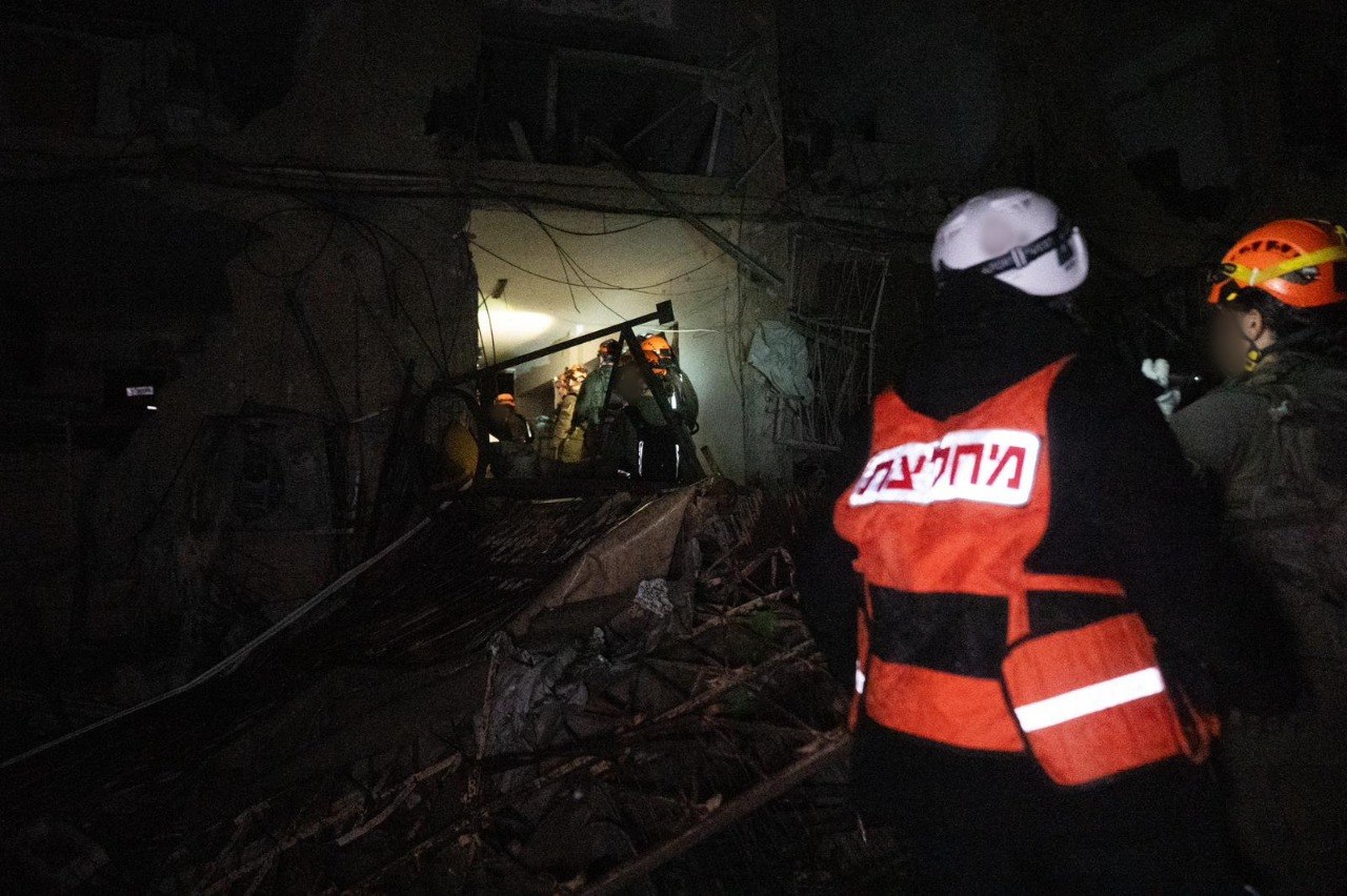 Documenting Home Front Command operations at an impact zone in southern Israel. Photo: IDF spokesperson